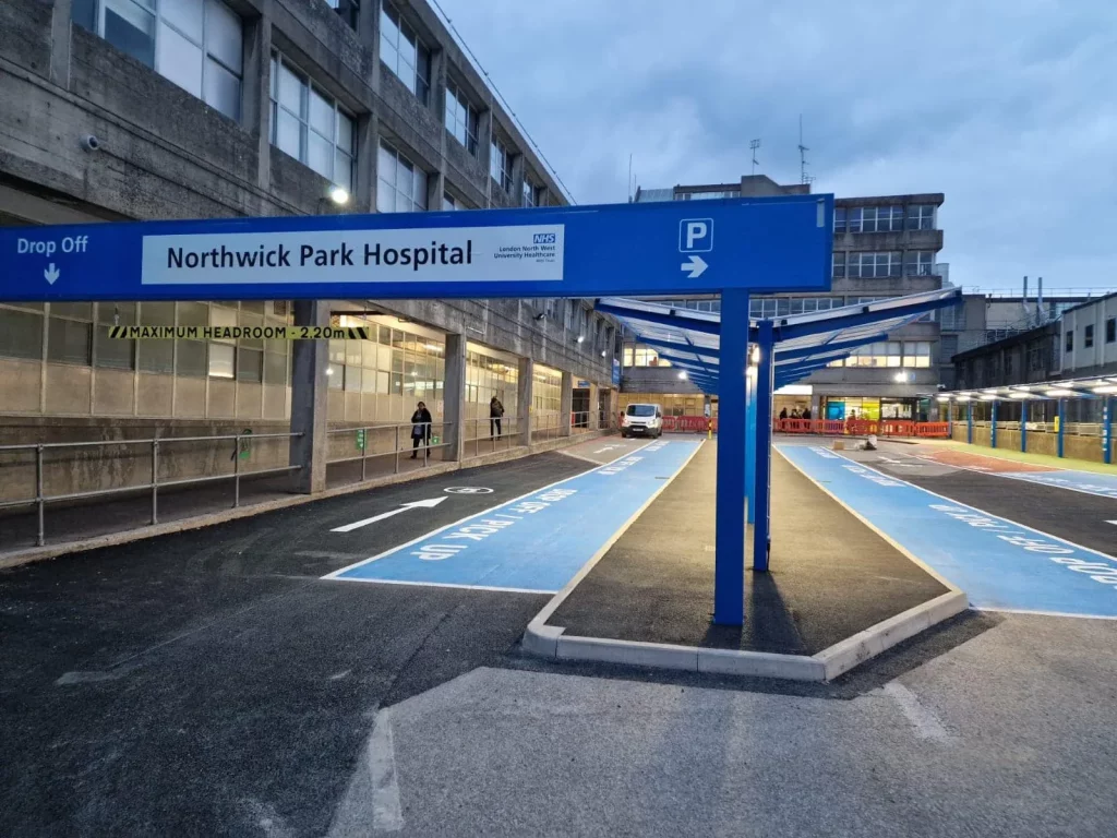 Blue drop-off canopies with new lighting installed by Nulectrics at Northwick Park Hospital